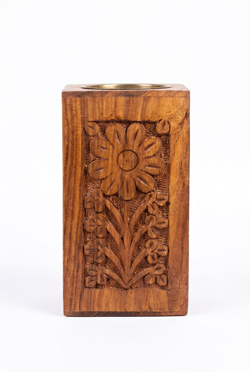 Gulistan Carved Bakhoor Burner — Tall carved wood burner with a brass bowl and floral relief.
